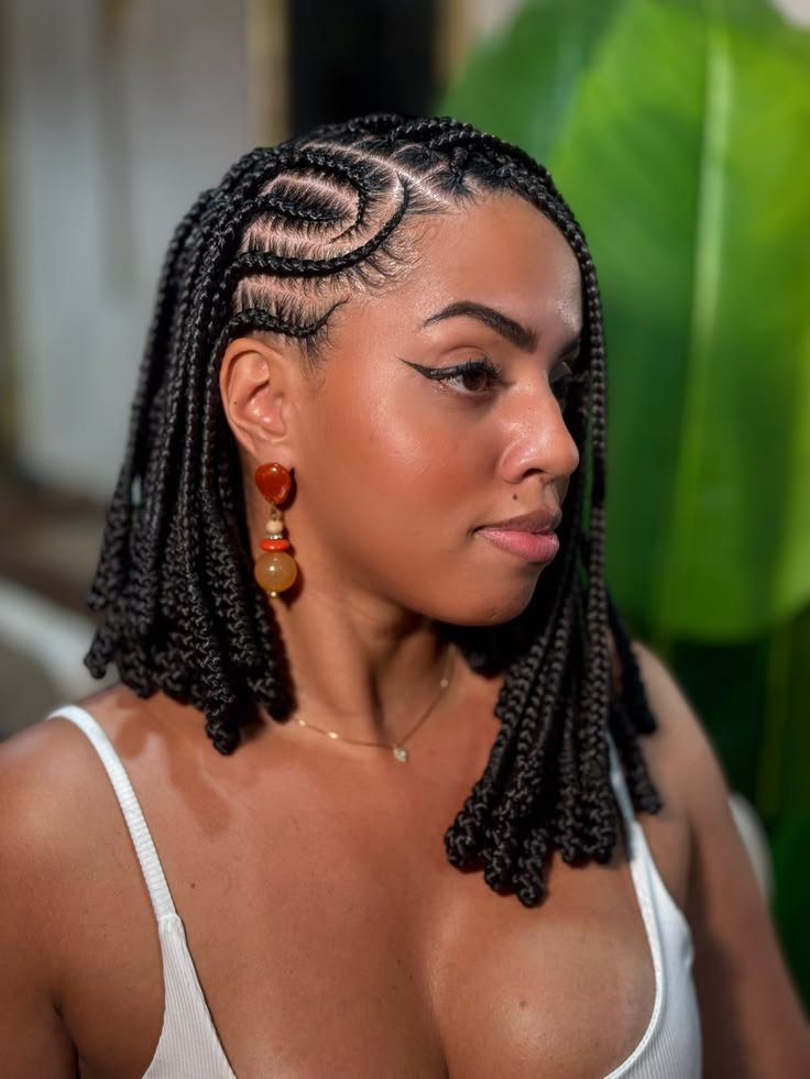 Loose cornrows laid close to the scalp without pulling at the hairline