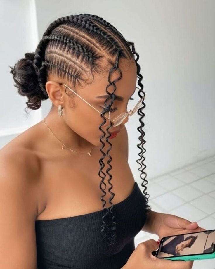 Two loose overnight braids tied on damp hair to set a soft wave by morning