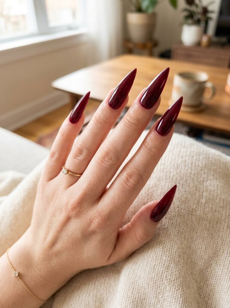Long stiletto nail shape with a sharp pointed tip